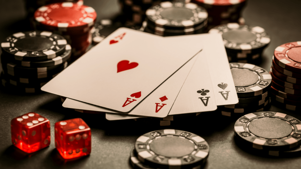 Playing cards, casino chips and dice