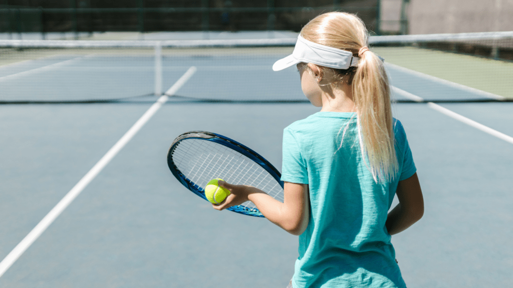 Girl playing Tennis