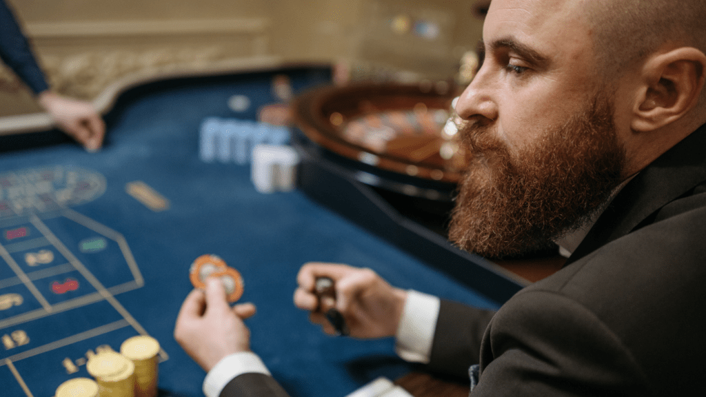 Man holding casino Chips